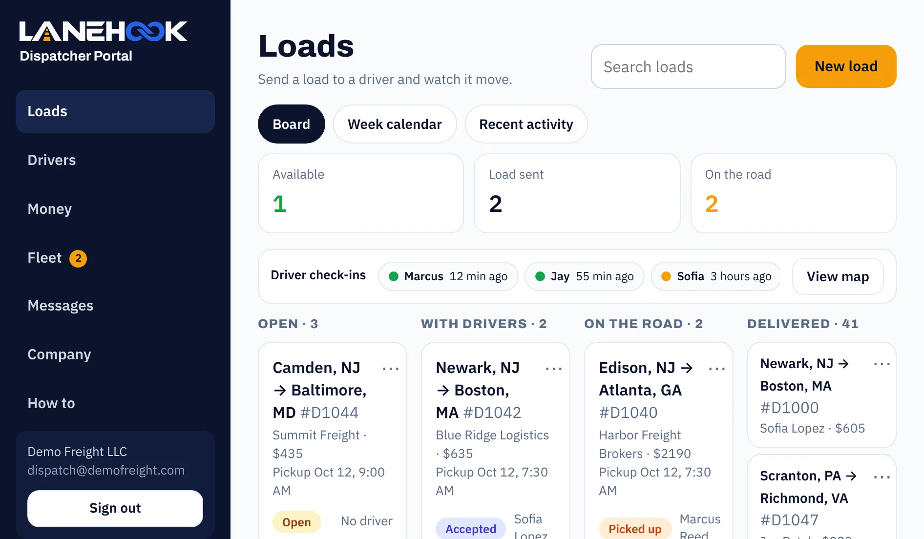 Dispatcher Portal loads board with Open, With drivers, On the road and Delivered columns